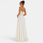 Woman wearing a white lace-up back gown on a white background