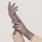 A pair of long, slim gloves in a muted taupe-brown color, worn on hands against a plain light gray background.