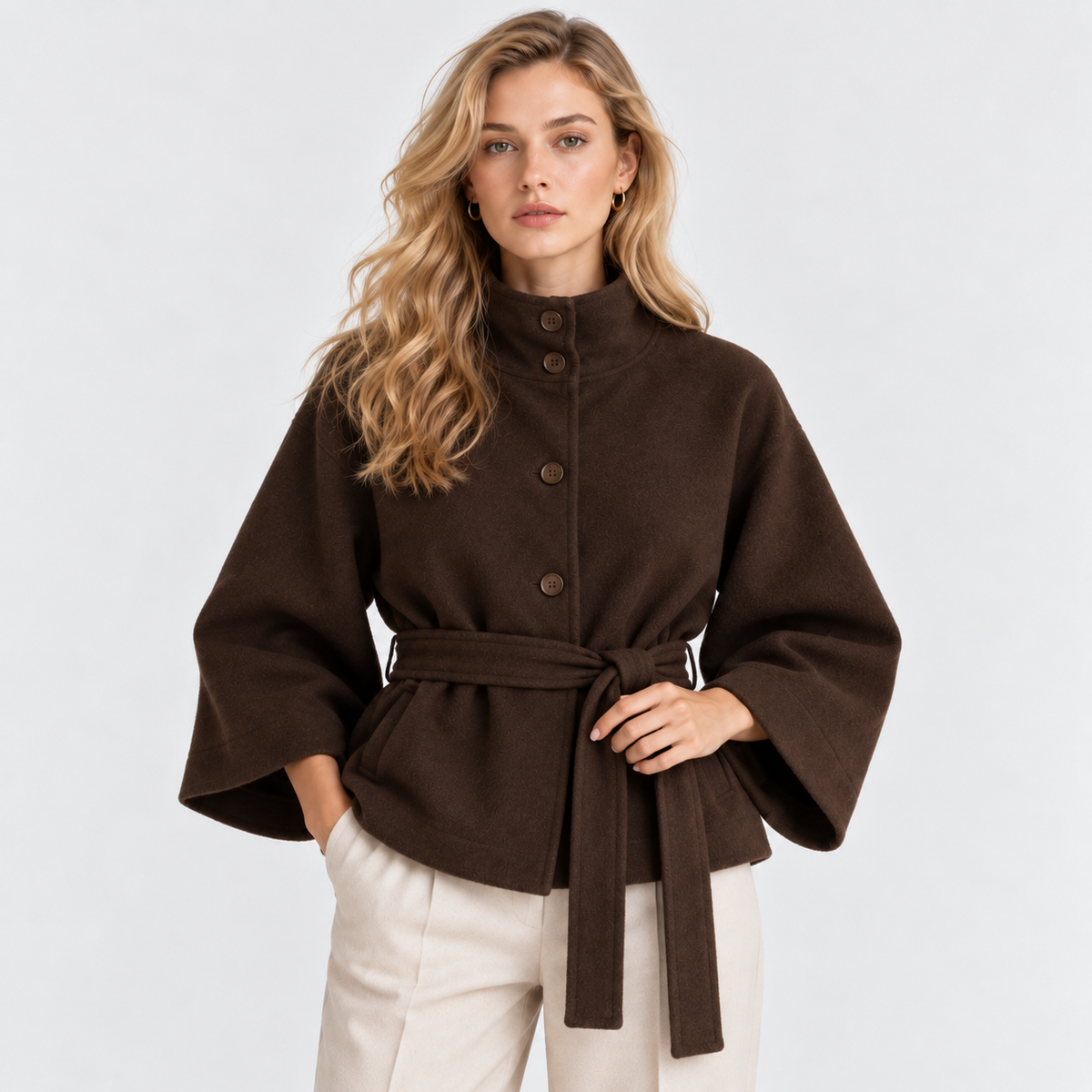 Women's dark brown cape coat with wide sleeves and matching waist belt