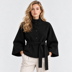 Women's black cape coat with wide three-quarter sleeves and matching waist belt