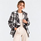 Women's gray and black plaid blazer styled with a white top and pants