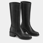 A pair of black leather knee-high boots with low block heels, shown from the side and back on a light gray background.