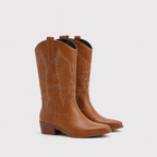 A pair of mid-calf brown leather cowboy boots with pointed toes, low block heels, and light tan embroidered wing designs on the shafts, shown against a plain light gray background.
