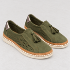 A pair of women's slip-on espadrille-style shoes in olive green suede, featuring perforated side panels, tassel details, a tan cork-look midsole, and off-white soles, shown on a light gray background.