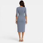Gray dress with embellished sleeves on a white background