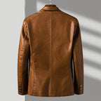 Brown leather jacket on a gray background