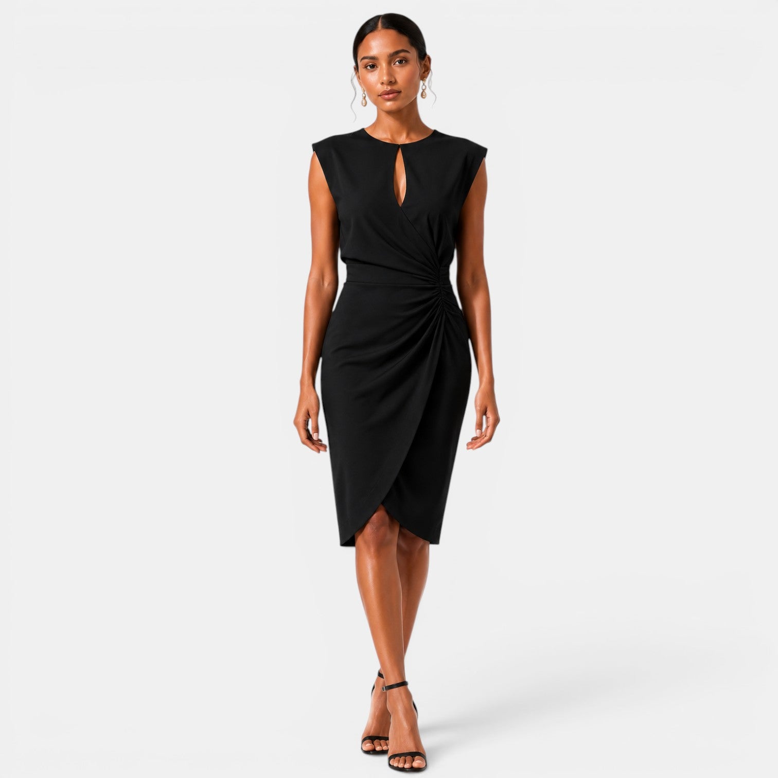Woman wearing a black dress on a white background
