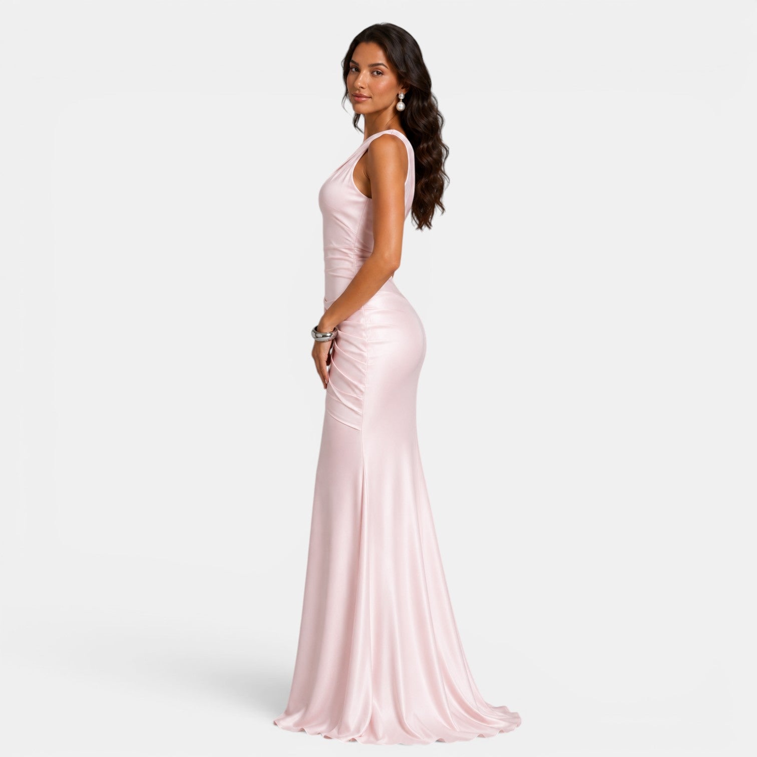 Woman wearing a pink evening gown on a white background
