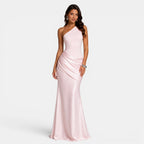 Woman wearing a pink one-shoulder gown on a white background