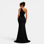 Woman wearing a black one-shoulder gown on a white background