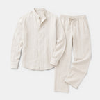 Beige shirt and pants set on a white background