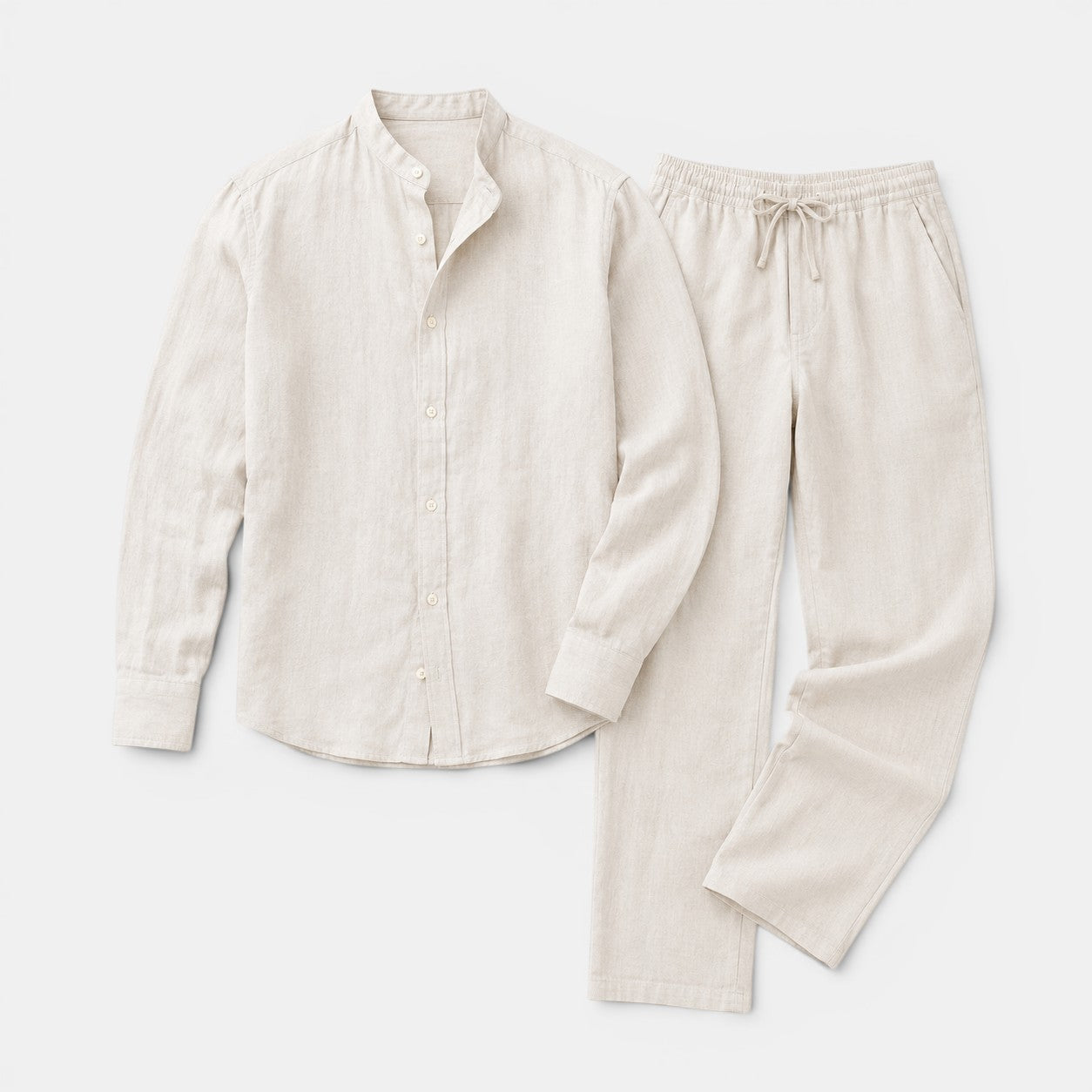 Beige shirt and pants set on a white background