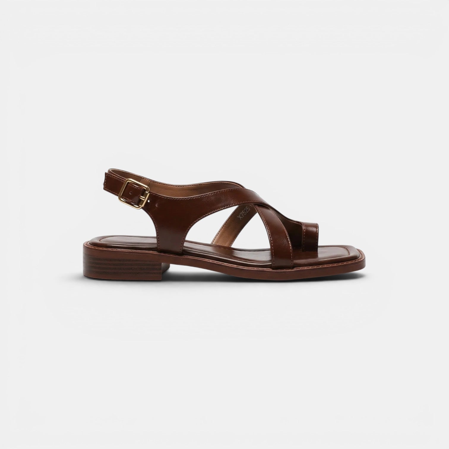 Black and green sandal with 'Merrell' branding on a white background