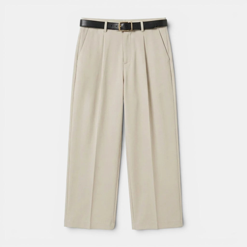 Beige pants with a black belt on a white background