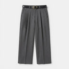 Gray pleated pants with a belt on a light gray background