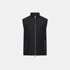 Black vest with zippers on a light gray background