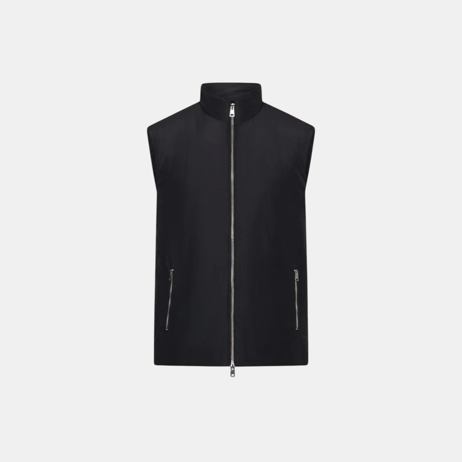 Black vest with zippers on a light gray background