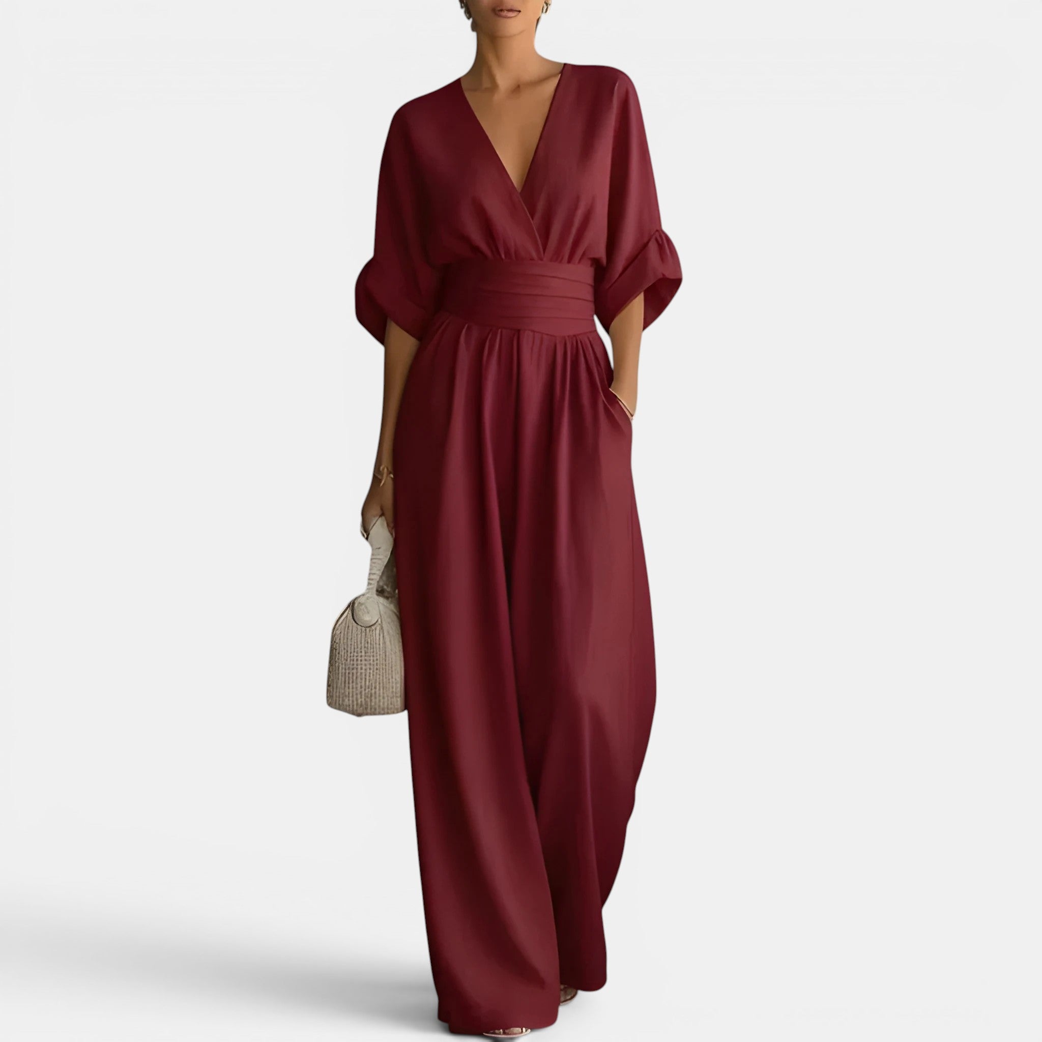 Maroon dress worn by a person on a white background