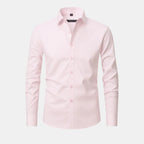 Pink dress shirt on a light gray background
