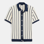 Striped shirt with navy and white colors on a light gray background