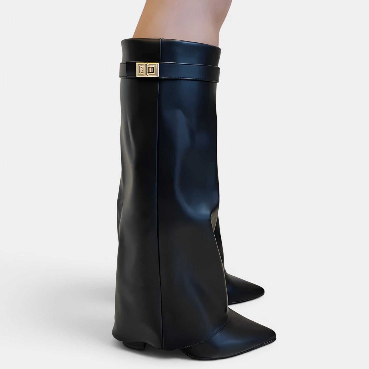 Black knee-high boots on a white background